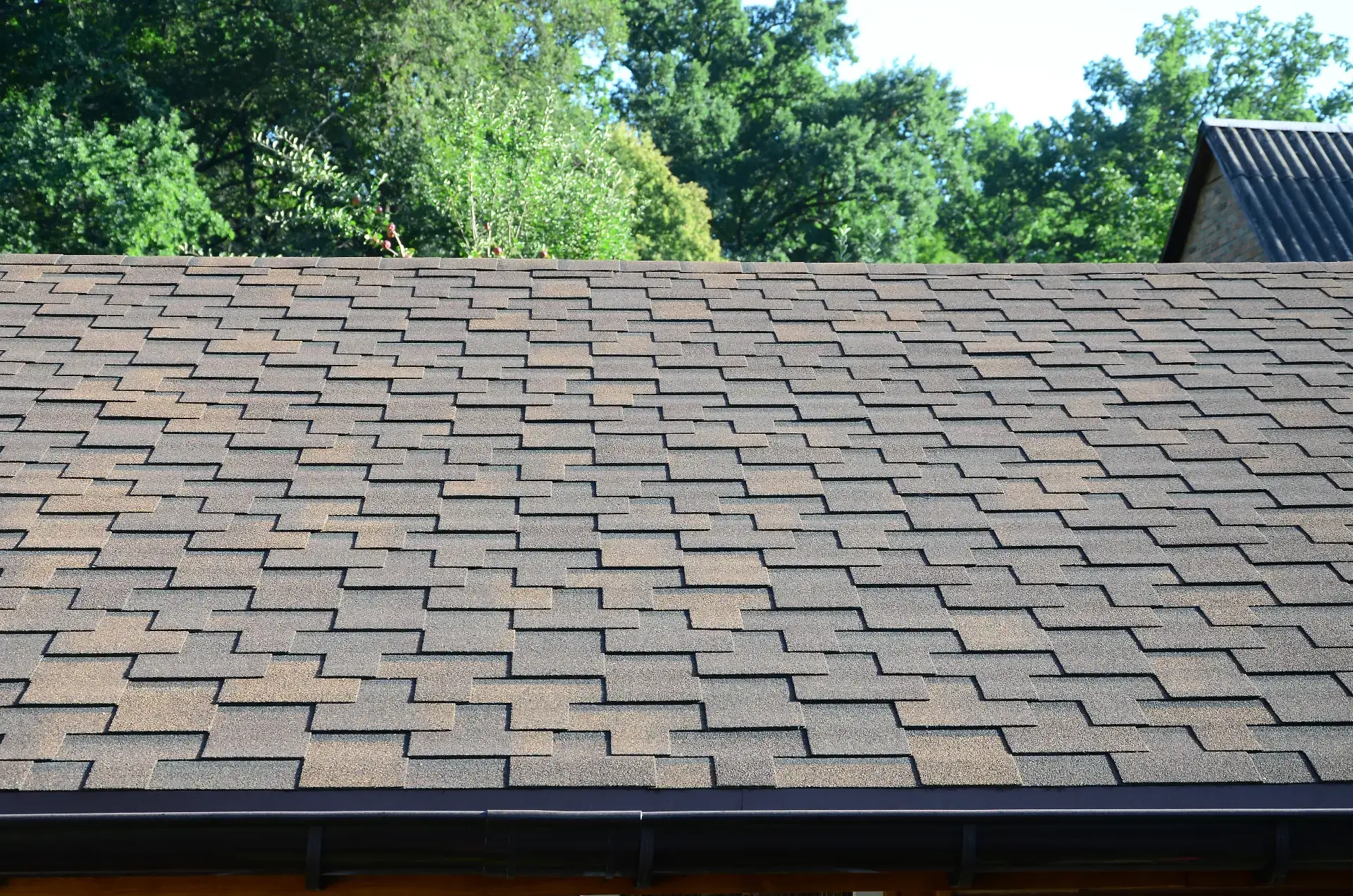 New asphalt shingle roof installed on a home in New York